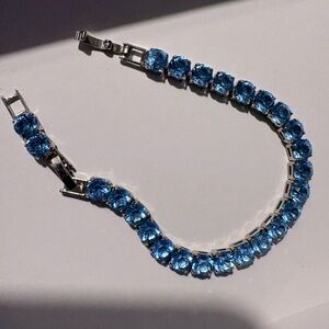 Blue Crystal Tennis Bracelet in Silver Tone